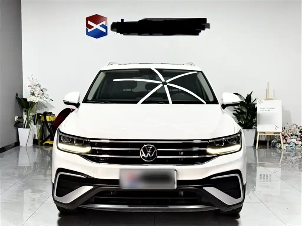 Volkswagen Tiguan L — фото 9