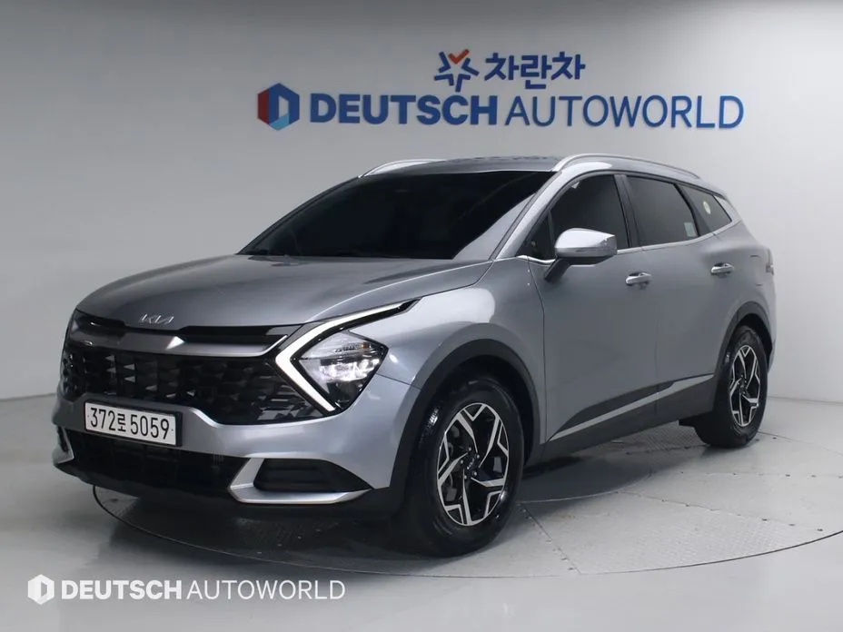 Kia Sportage — фото 1