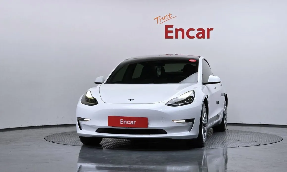 Tesla Model 3 — фото 5