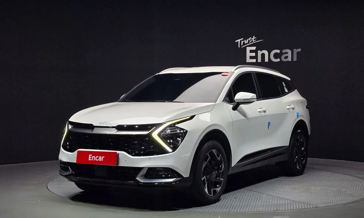 Kia Sportage — фото 1