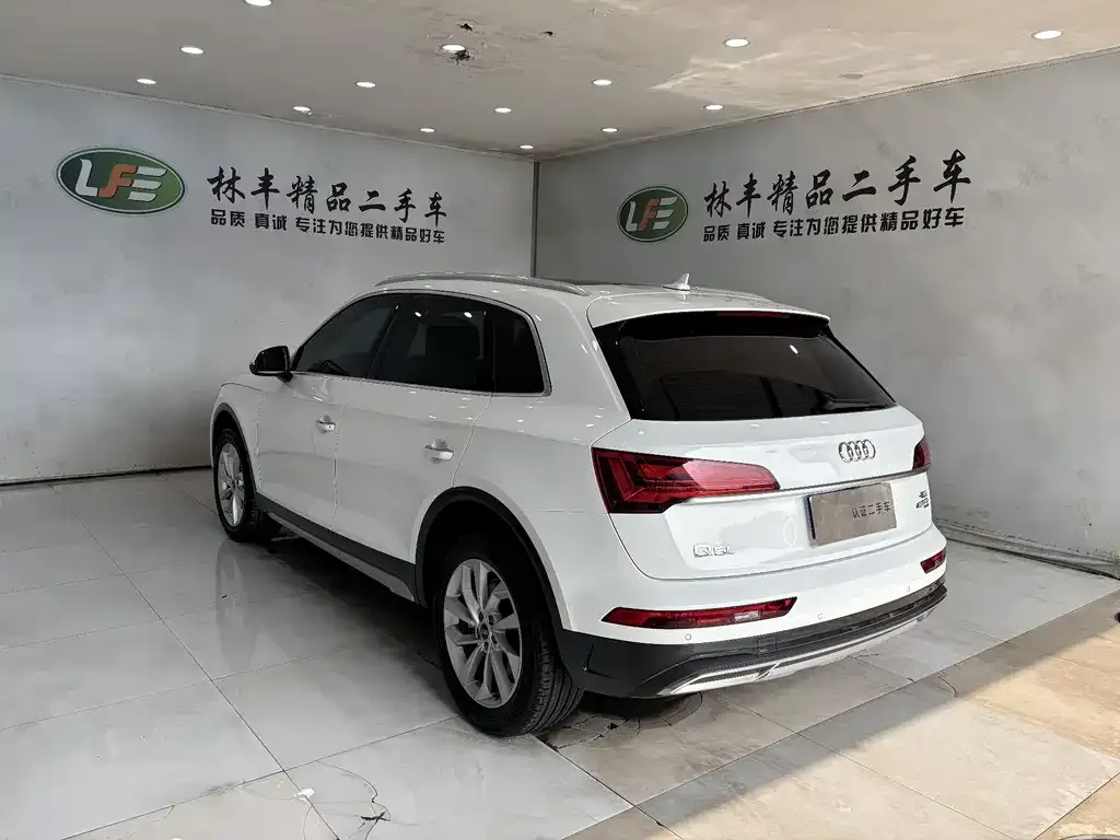 Audi Q5L — фото 7