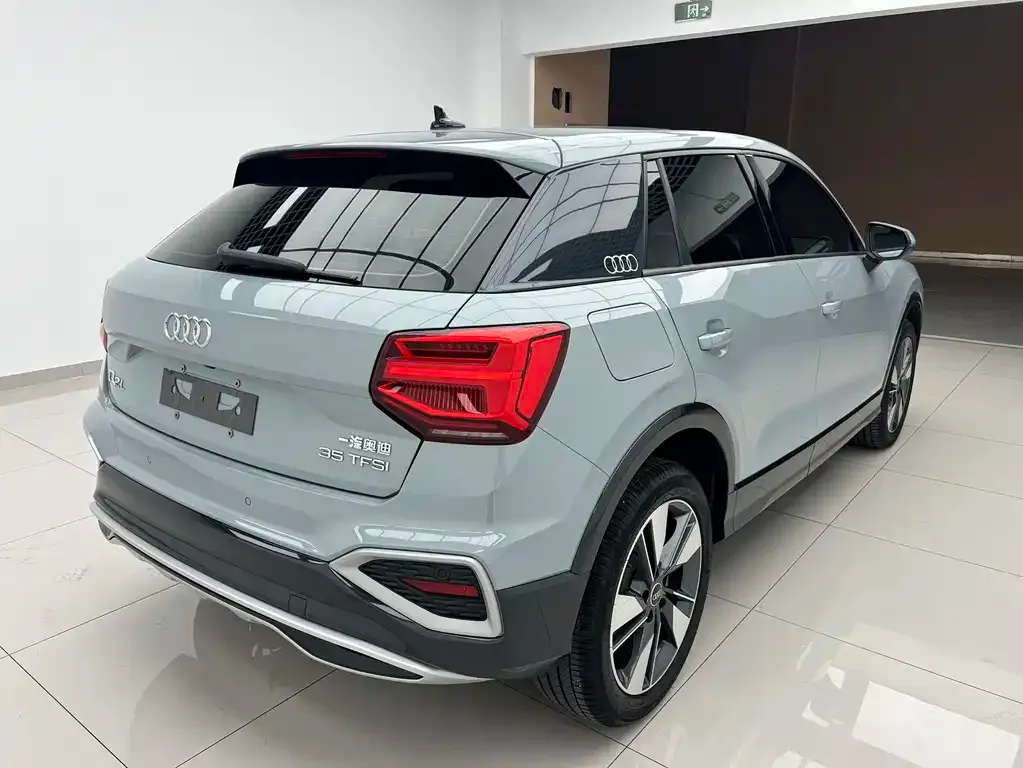 Audi Q2L — фото 6