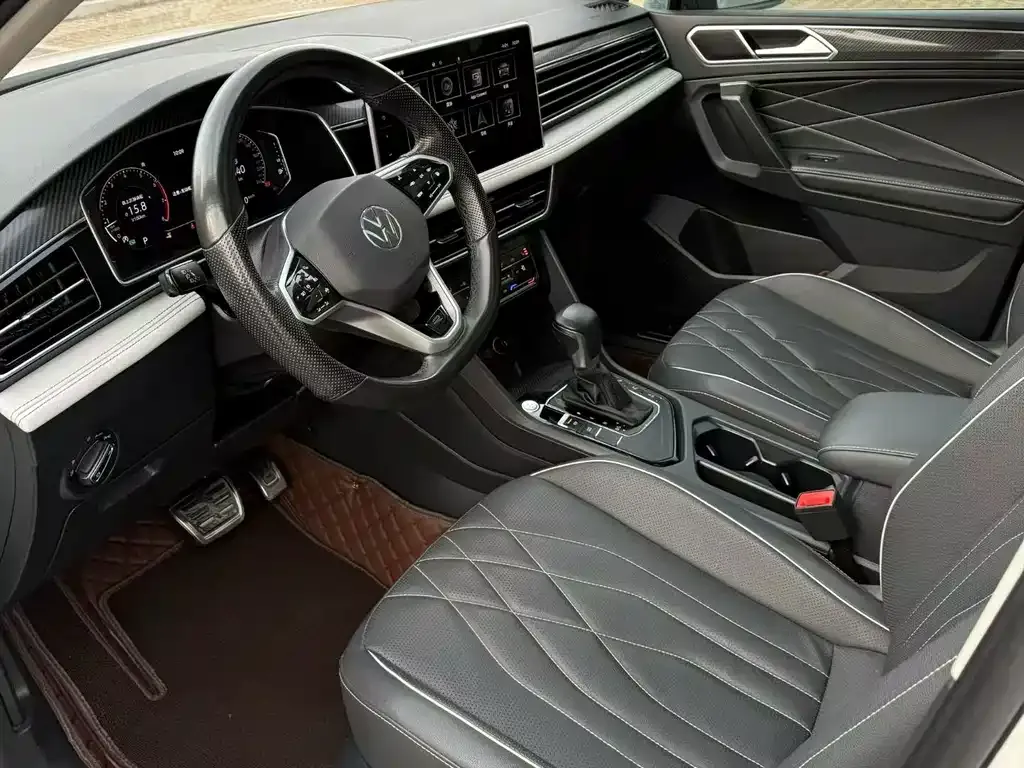Volkswagen Tiguan L — фото 9