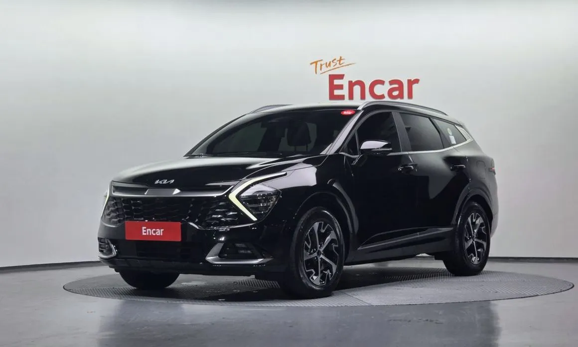 Kia Sportage — фото 1