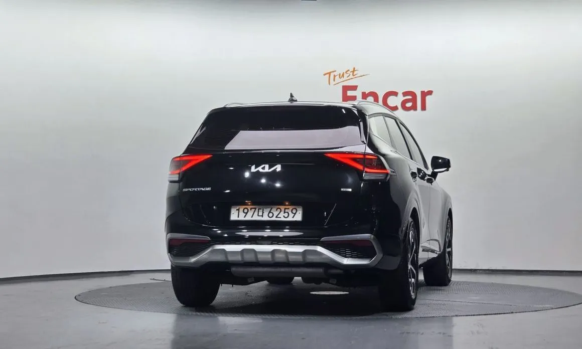 Kia Sportage — фото 7