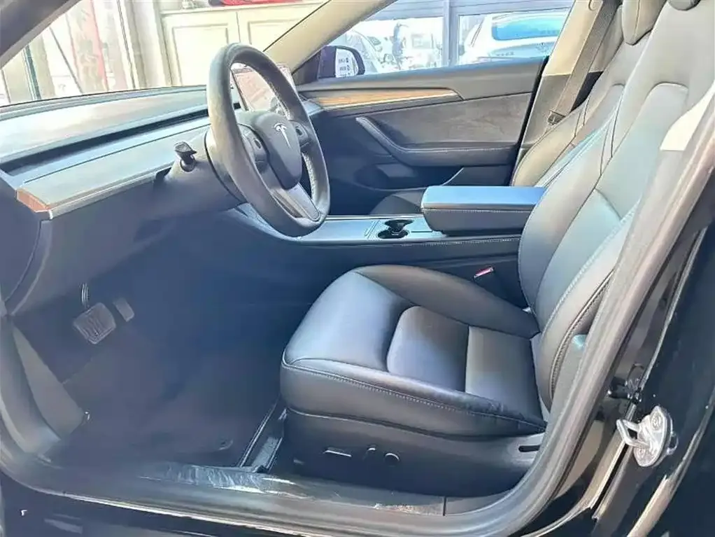 Tesla Model 3 — фото 8