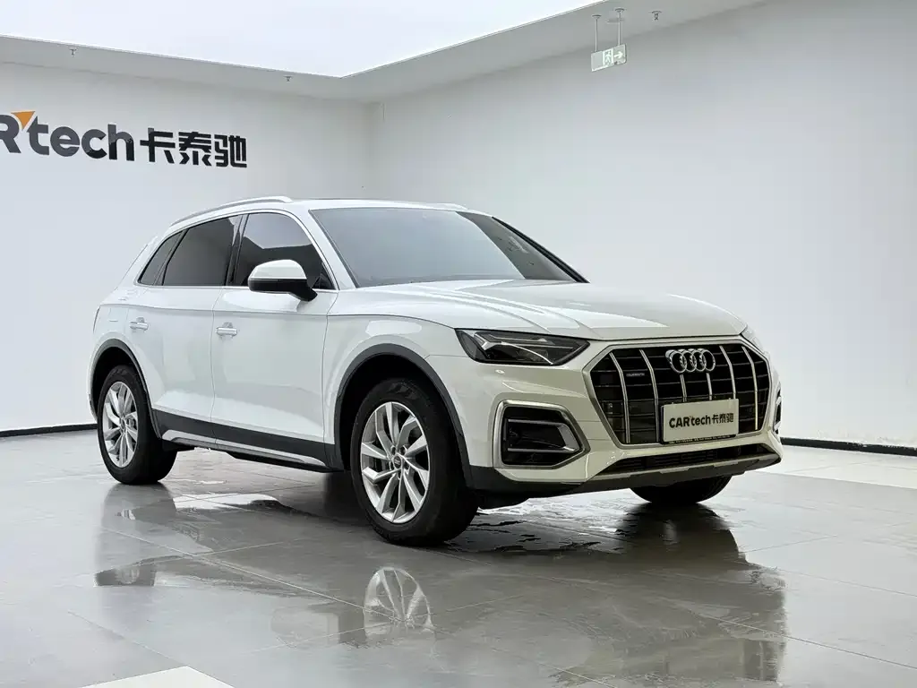 Audi Q5L — фото 10