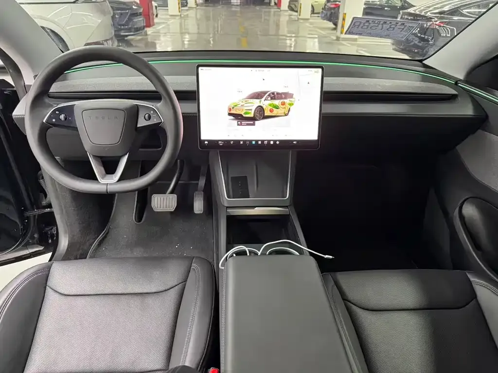 Tesla Model Y — фото 10