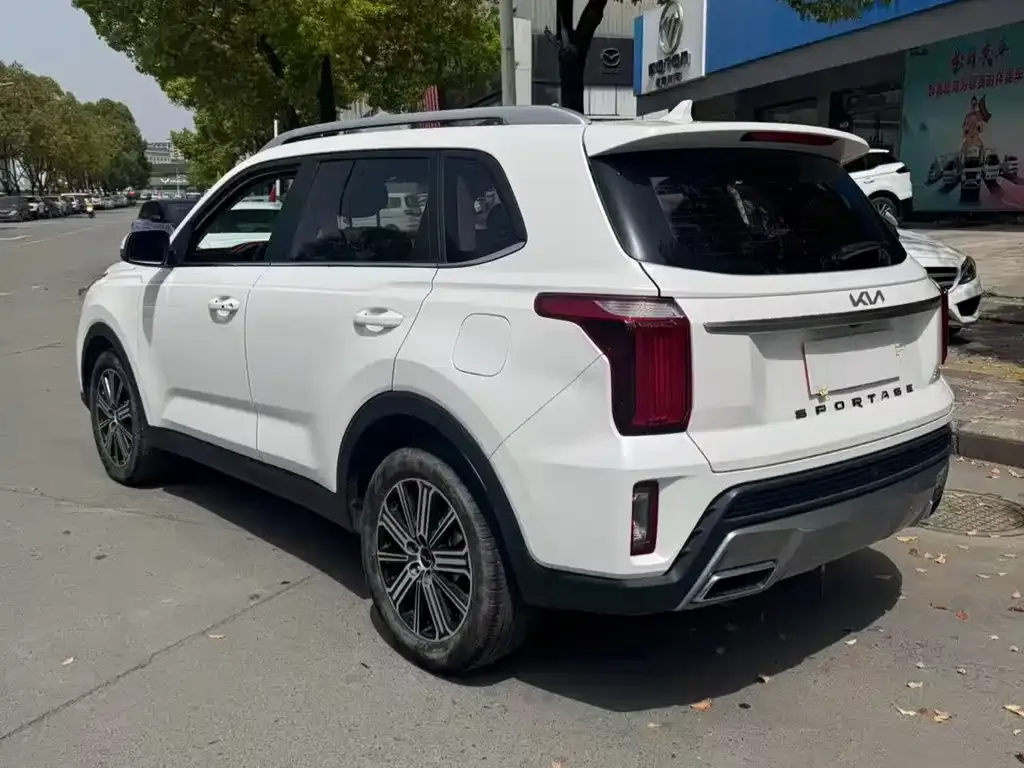 Kia Sportage — фото 9