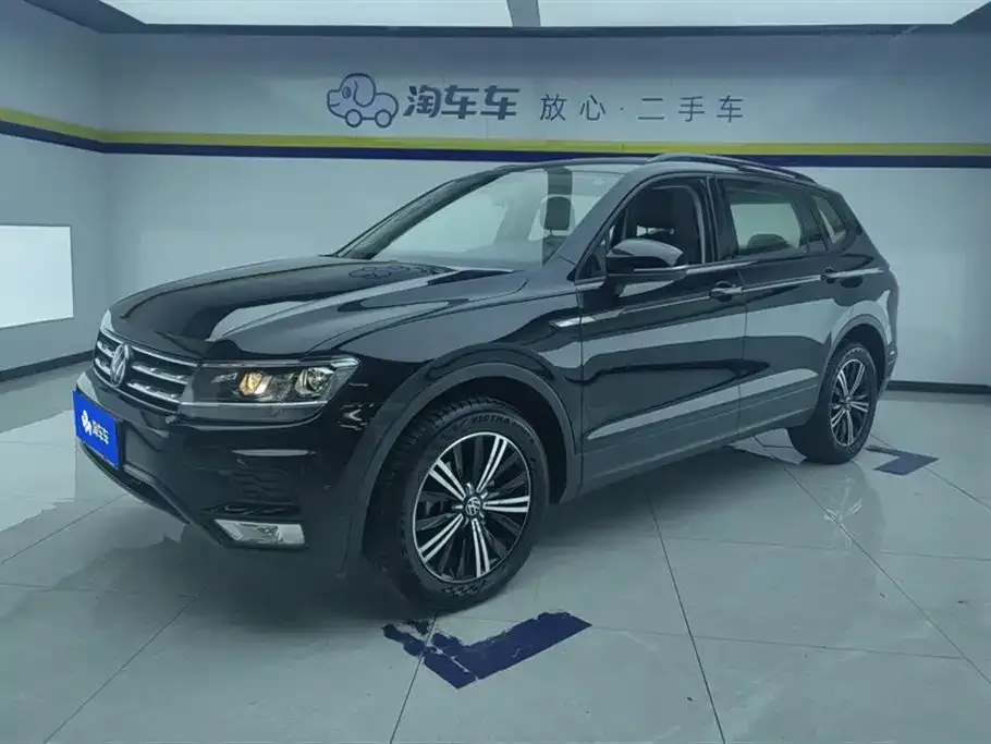 Volkswagen Tiguan L — фото 1