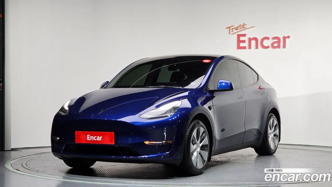 Tesla Model Y — фото 1