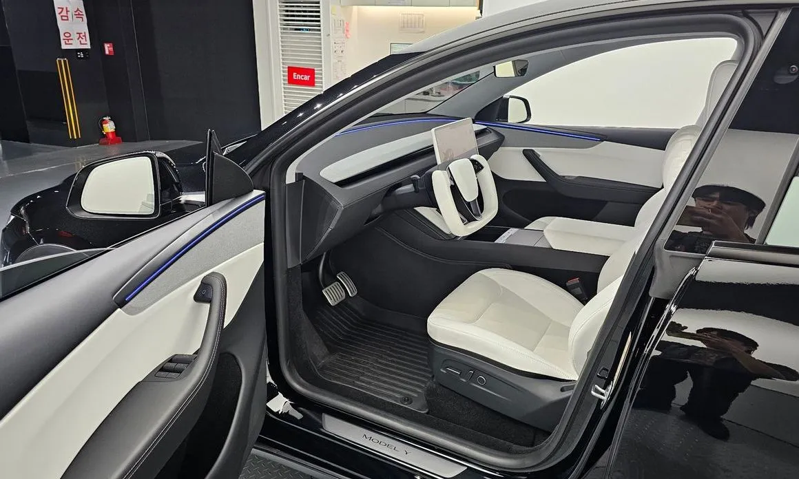 Tesla Model Y — фото 10