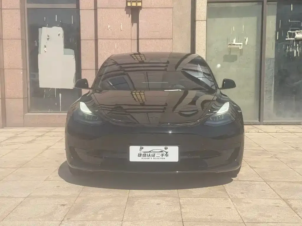Tesla Model 3 — фото 7