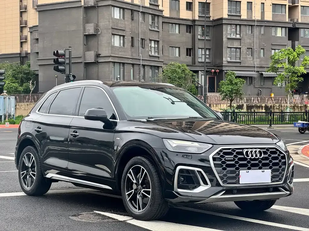 Audi Q5L — фото 5