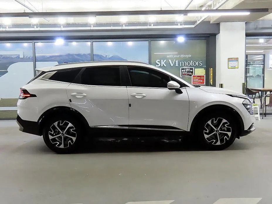 Kia Sportage — фото 10