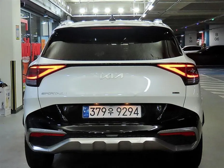 Kia Sportage — фото 7