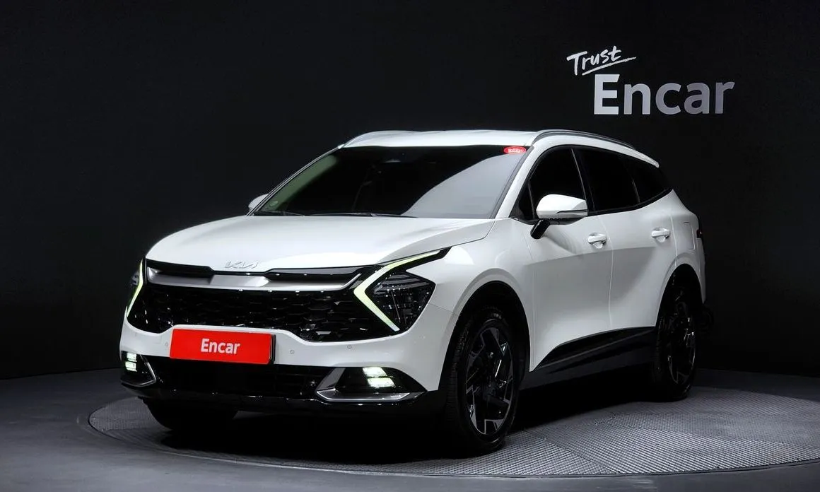 Kia Sportage — фото 1