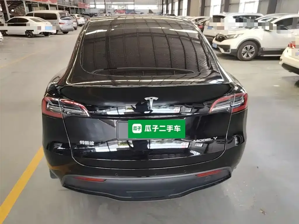Tesla Model Y — фото 9