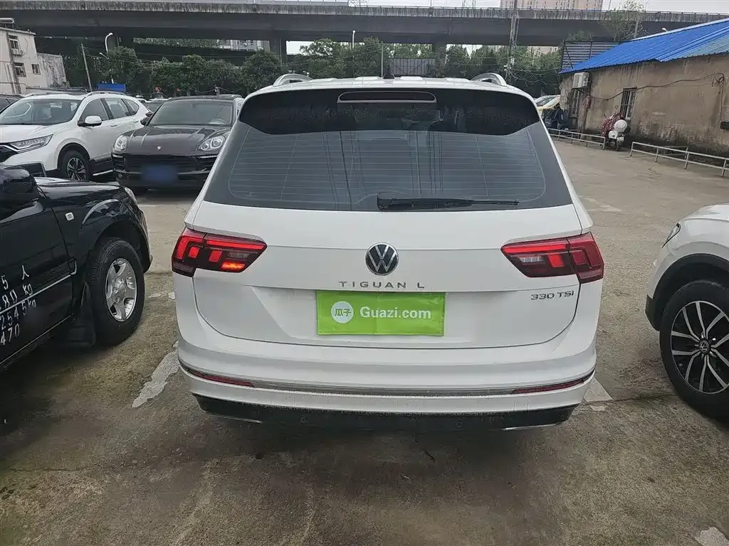 Volkswagen Tiguan L — фото 10
