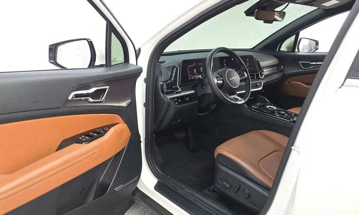 Kia Sportage — фото 5