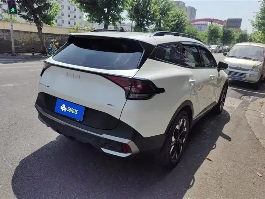 Kia Sportage — фото 10