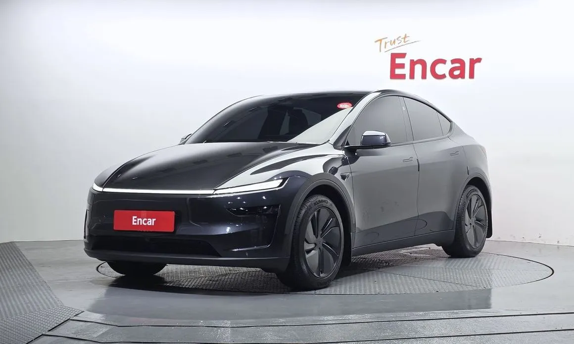 Tesla Model Y — фото 1