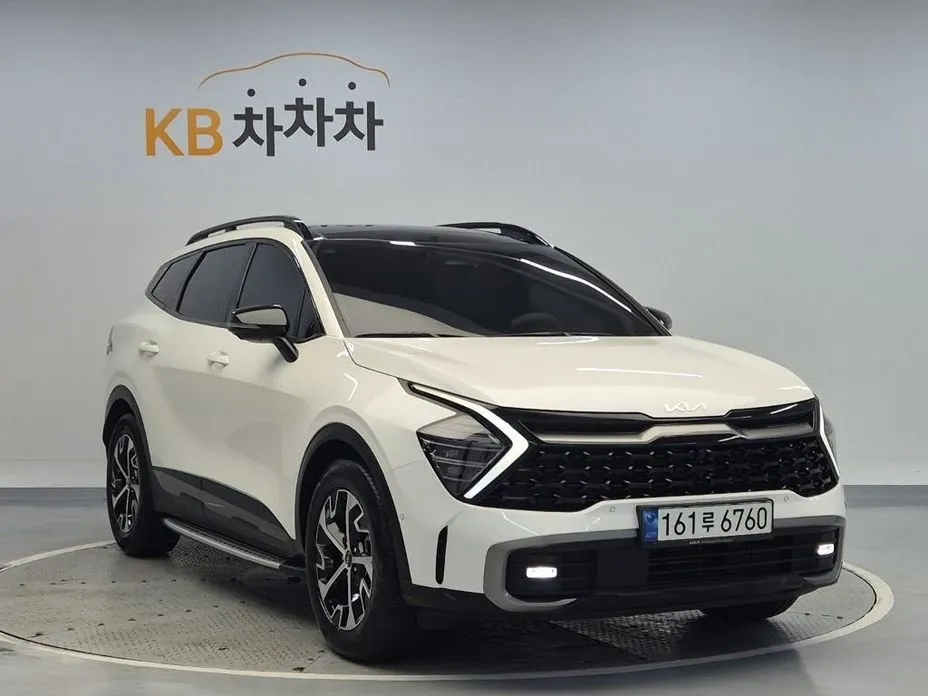 Kia Sportage — фото 1