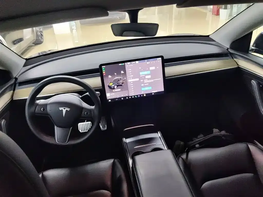 Tesla Model Y — фото 7