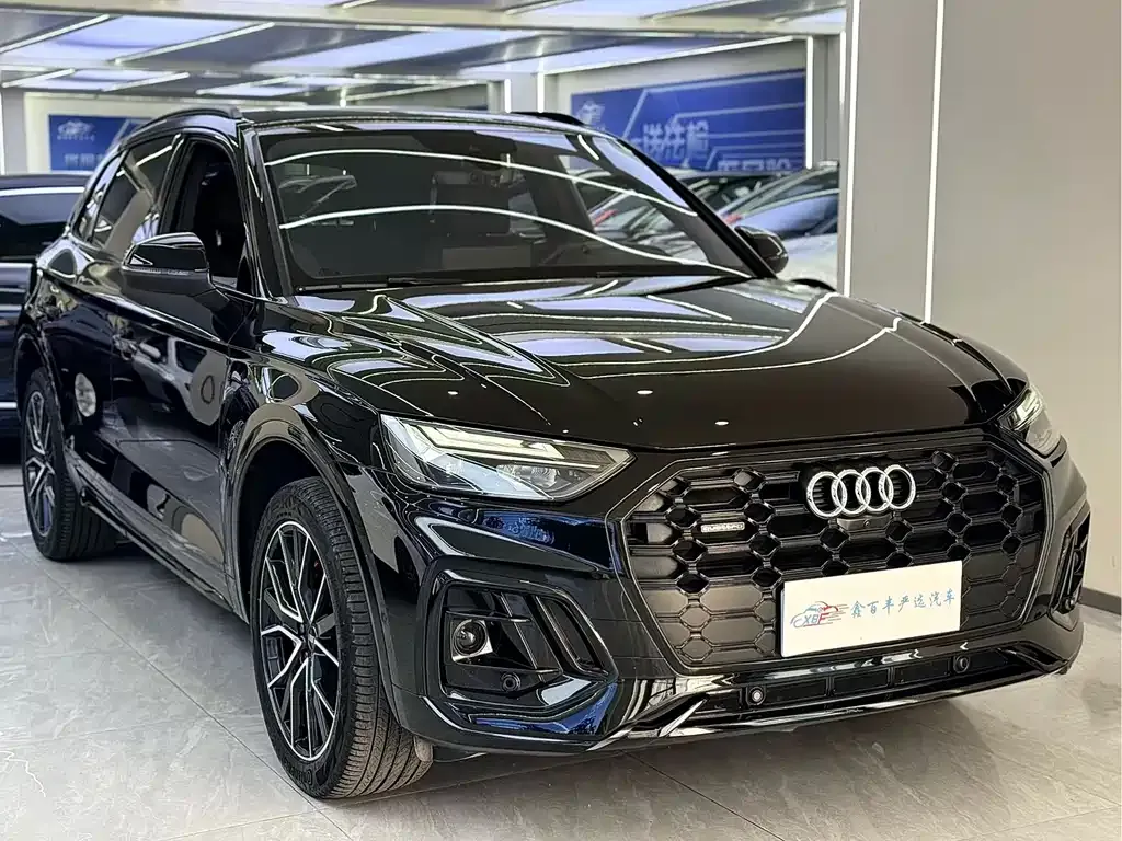 Audi Q5L — фото 10
