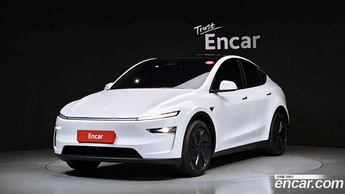 Tesla Model Y — фото 1
