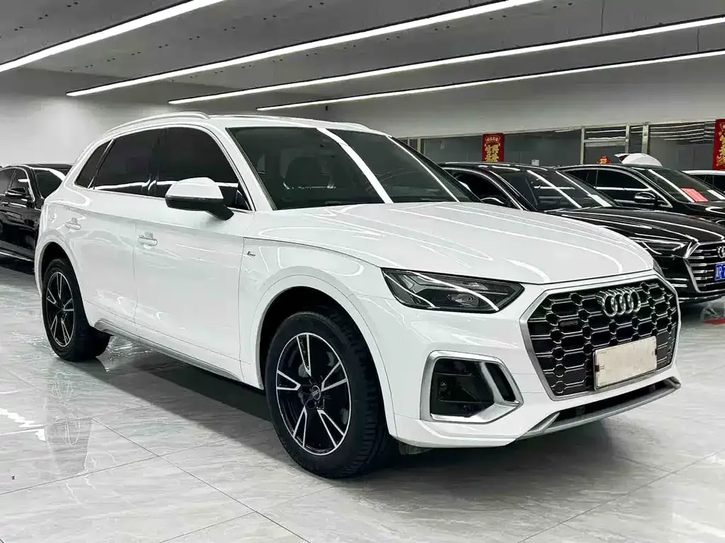 Audi Q5L — фото 5
