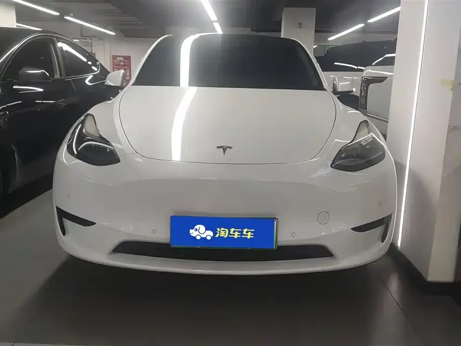 Tesla Model Y — фото 9