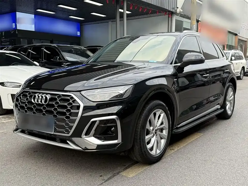 Audi Q5L — фото 8