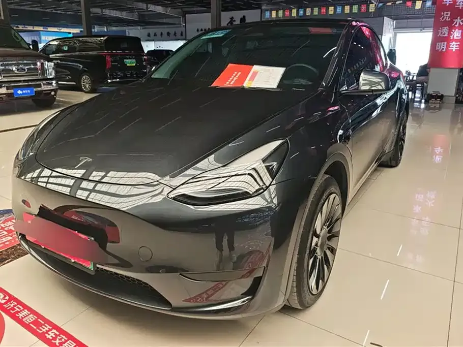 Tesla Model Y — фото 1