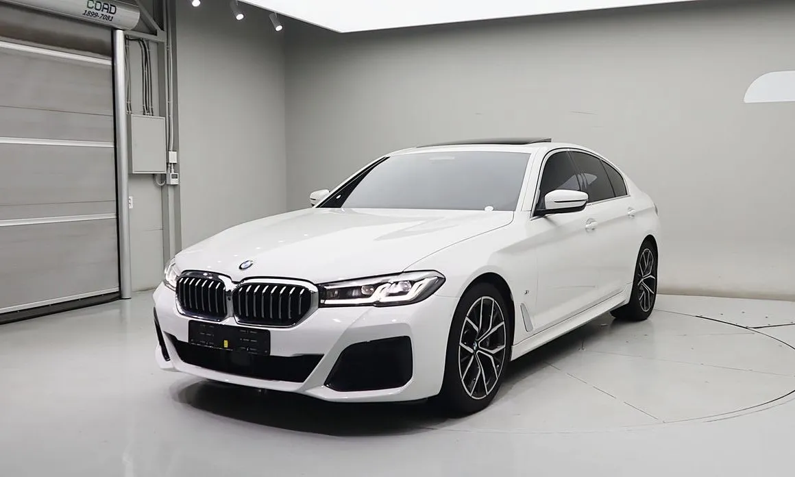 BMW 5-Series — фото 1