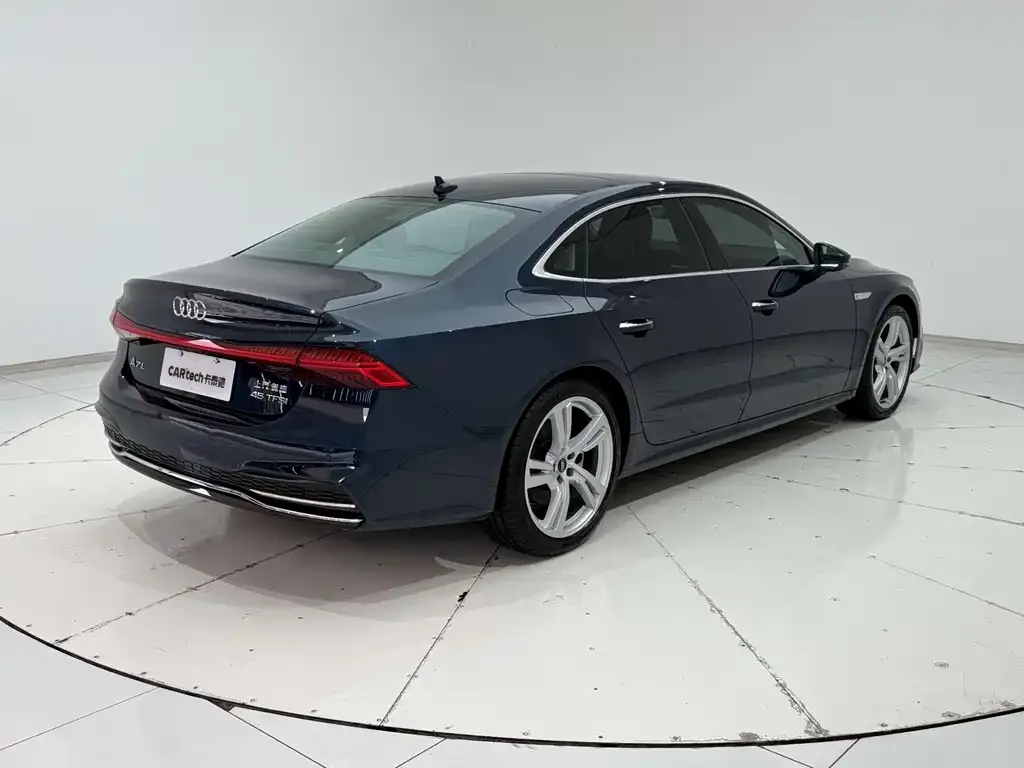 Audi A7L — фото 8