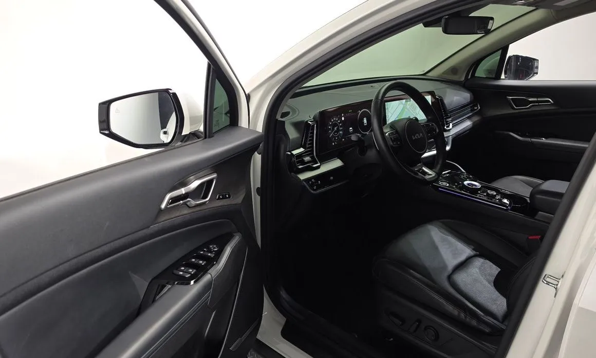 Kia Sportage — фото 8