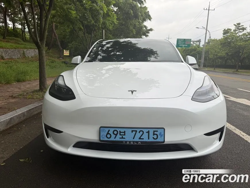 Tesla Model Y — фото 7