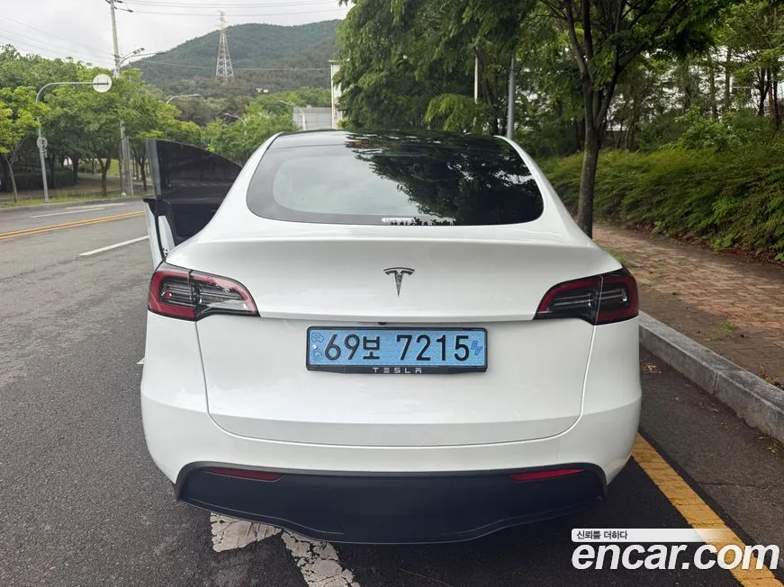 Tesla Model Y — фото 9