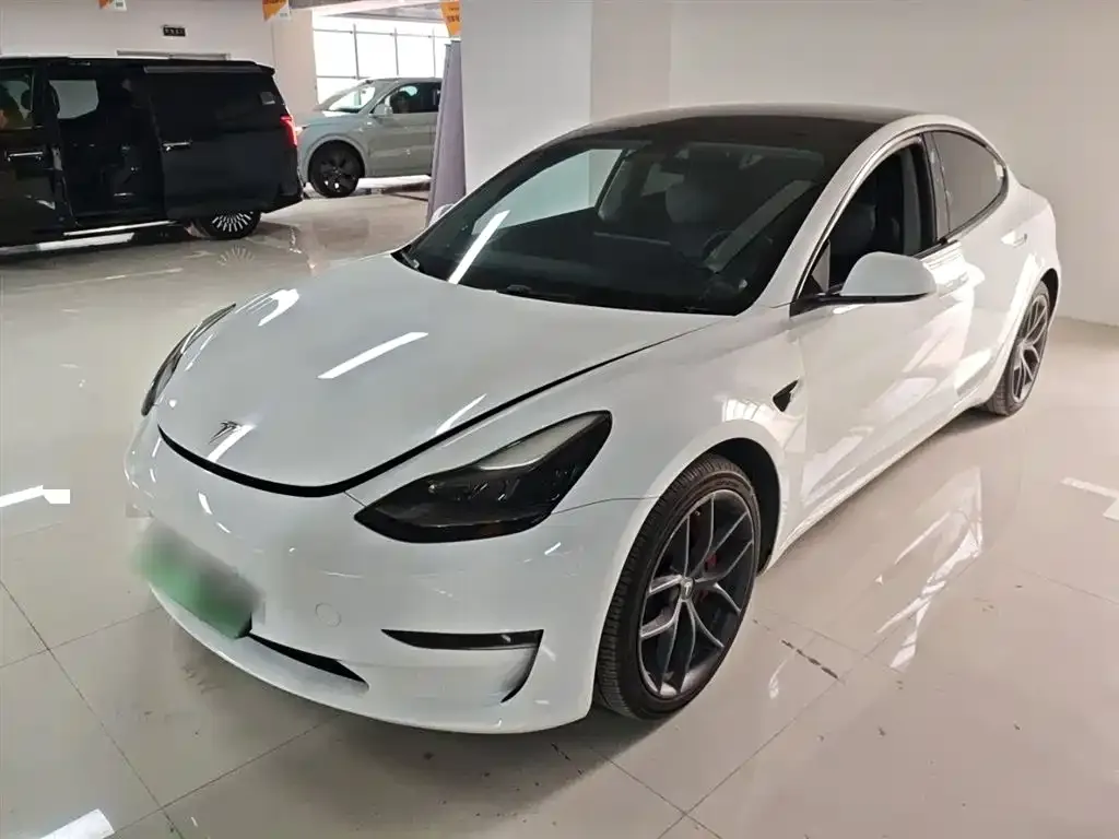 Tesla Model 3 — фото 6