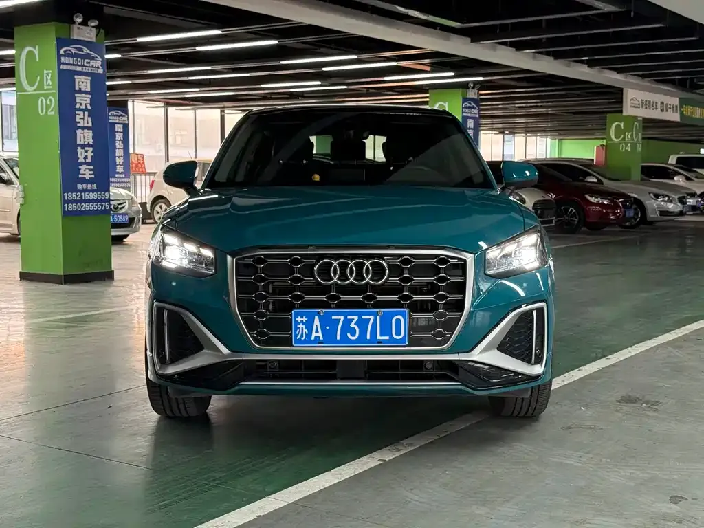Audi Q2L — фото 6