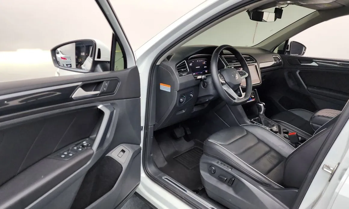 Volkswagen Tiguan — фото 10