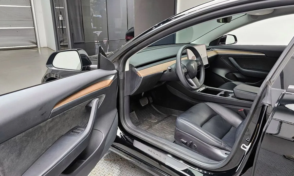 Tesla Model 3 — фото 9