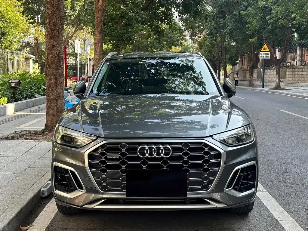 Audi Q5L — фото 10