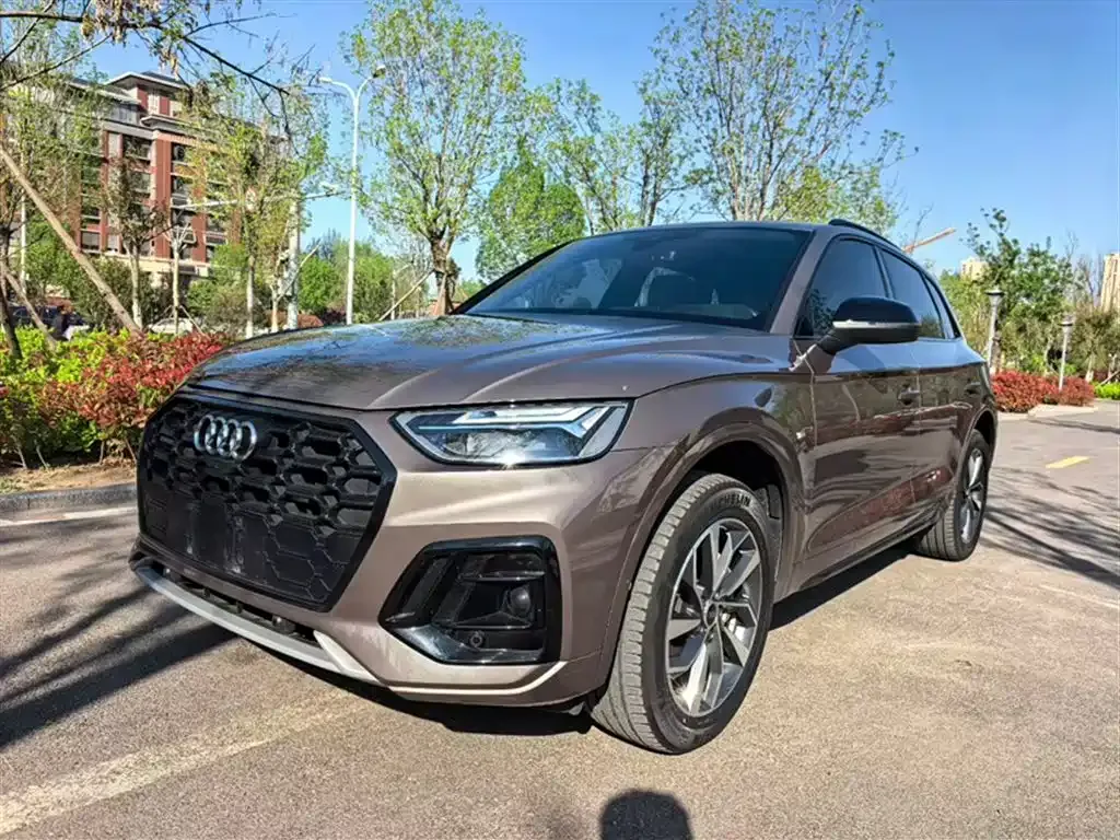 Audi Q5L — фото 10
