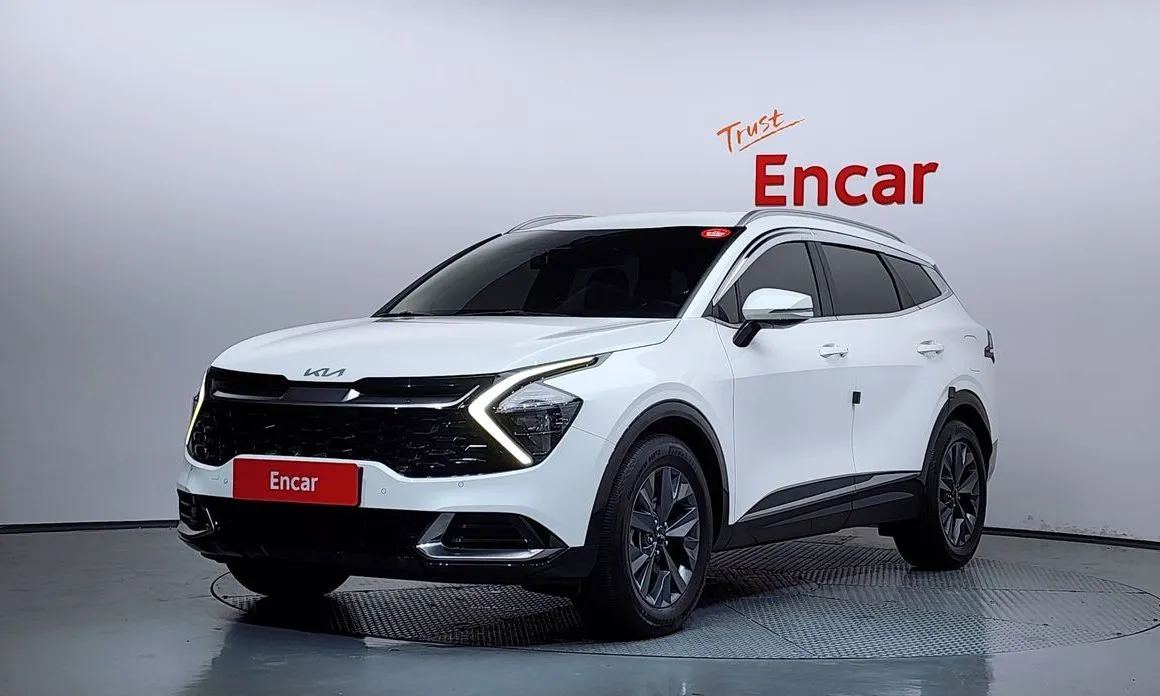 Kia Sportage — фото 1