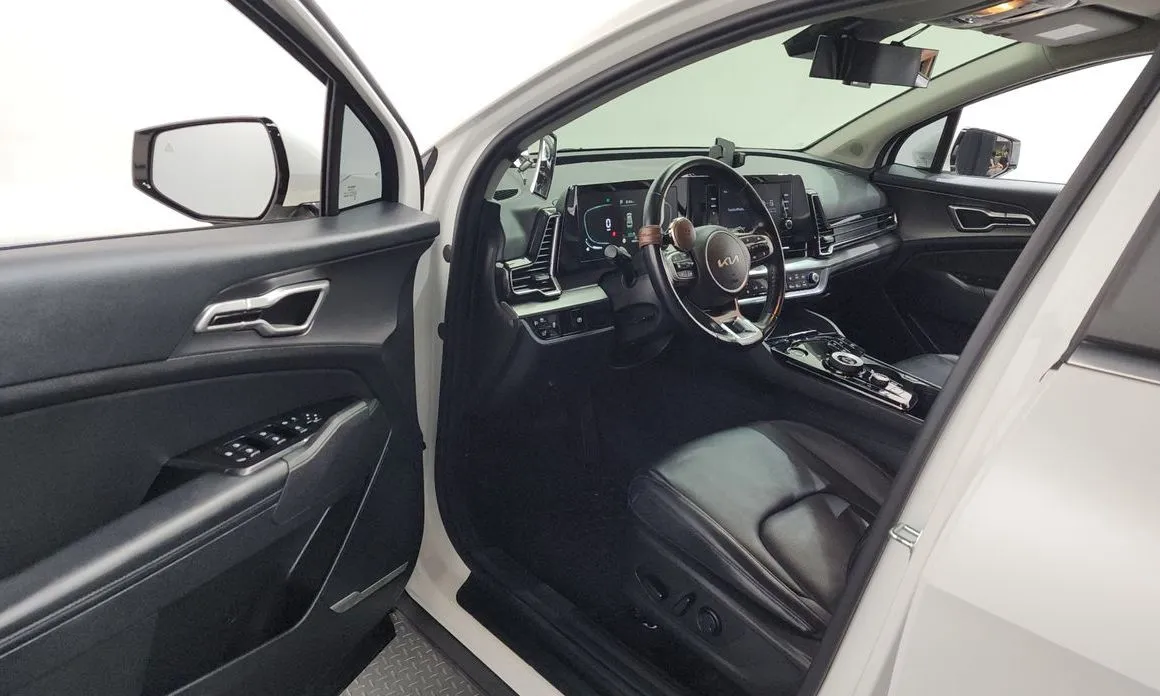 Kia Sportage — фото 5