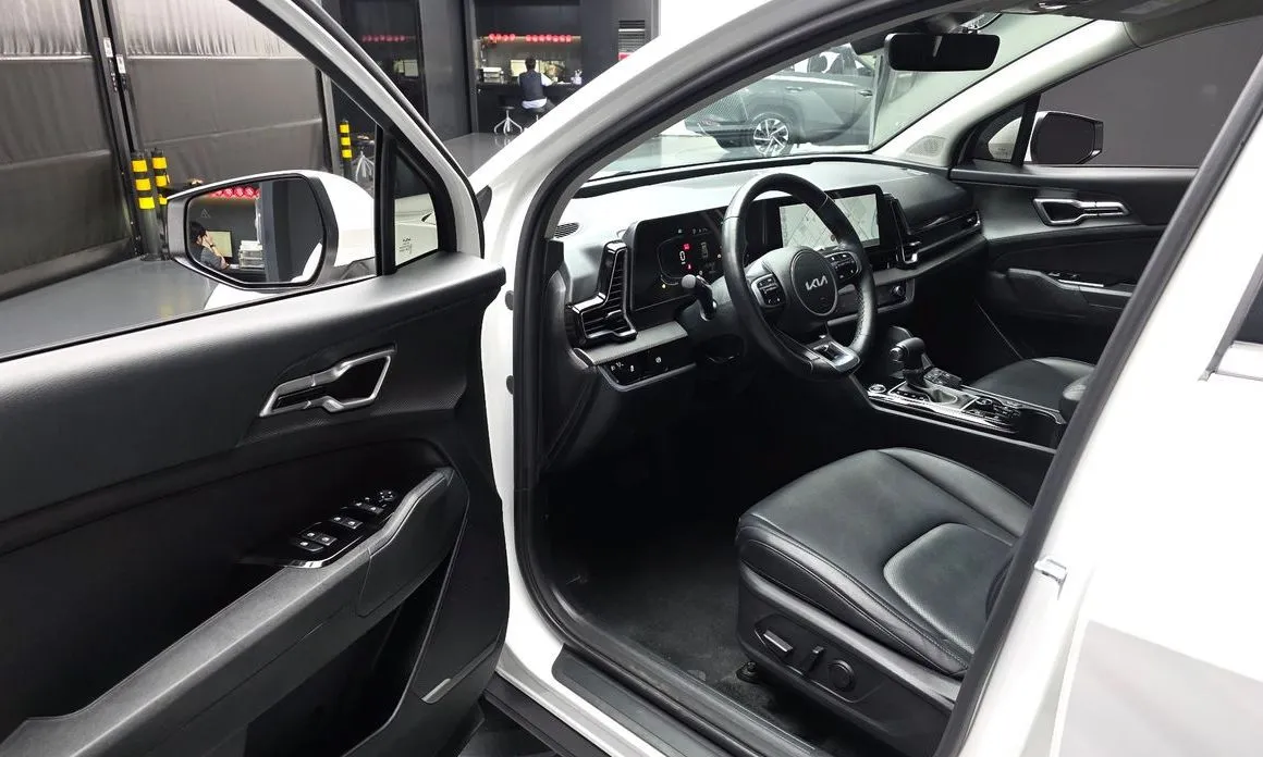 Kia Sportage — фото 10
