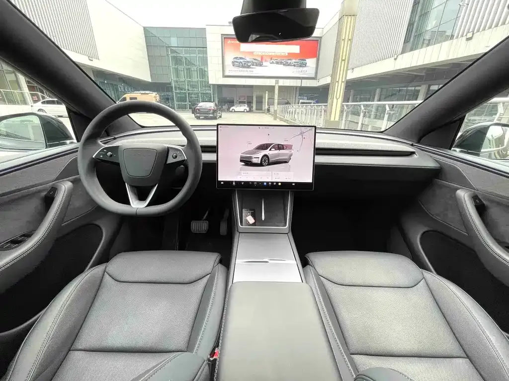 Tesla Model Y — фото 7