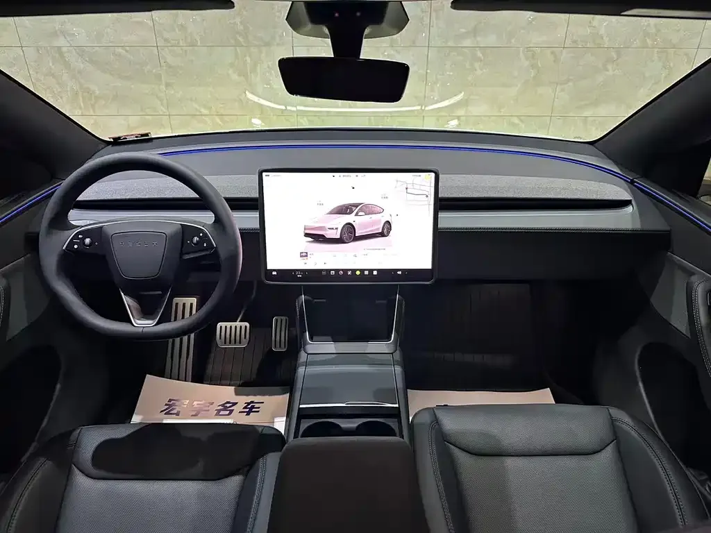 Tesla Model Y — фото 6